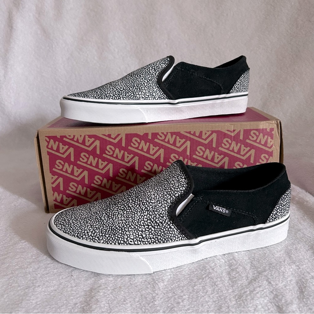 Vans Black and White Slip-On Sneakers